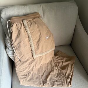 Nike Windbreaker Joggers with Sherpa Accents